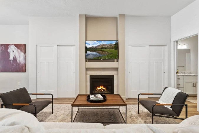 Living room seating around the gas fireplace