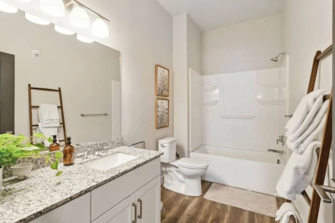 Bathroom with tub and vanity
